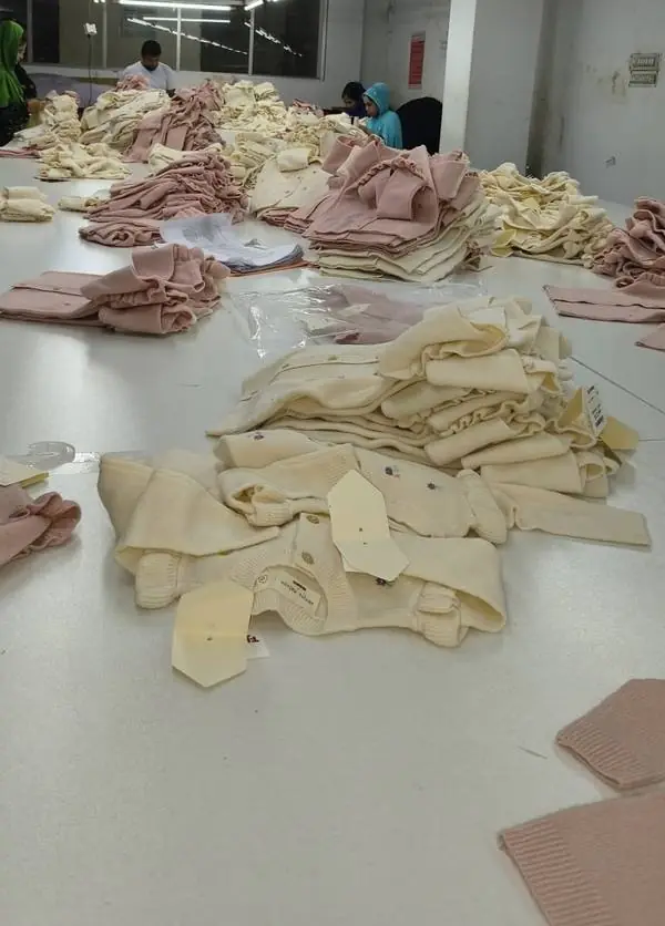 AQL 2.5 quality check on knitwear at a Bangladesh factory