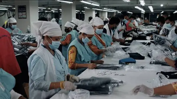 Packaging line at a Bangladesh apparel buying house partner factory